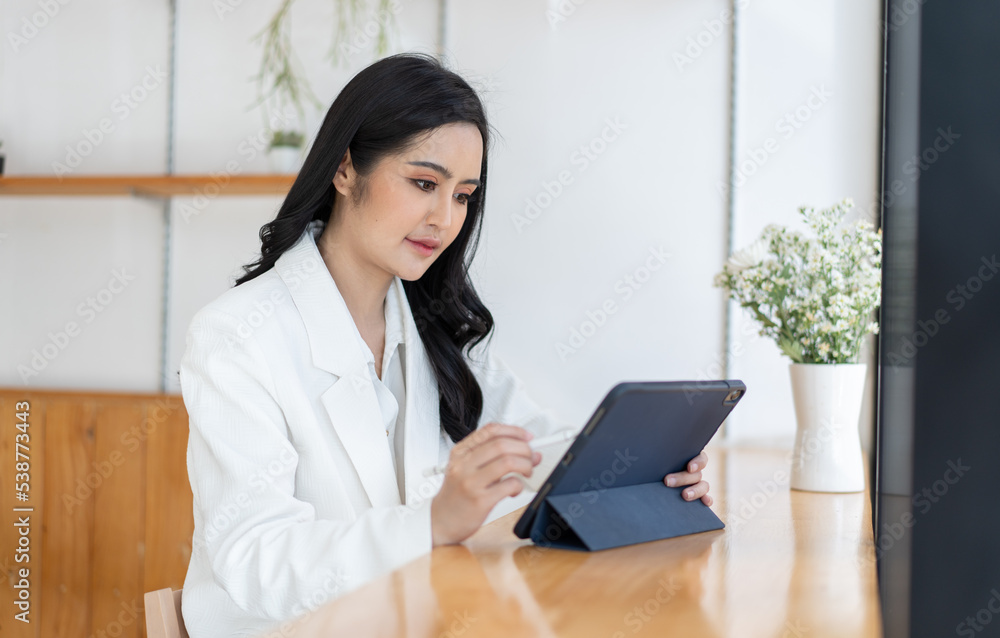 Happy asian young female client surf web read news or chat on tablet device, technology concept. Happy asian young female client surf web read news or chat on tablet device, technology concept.