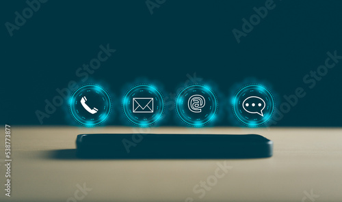concept, Customer support hotline Contact us people connection. email, call phone, address, Chat message icons. on smartphone.