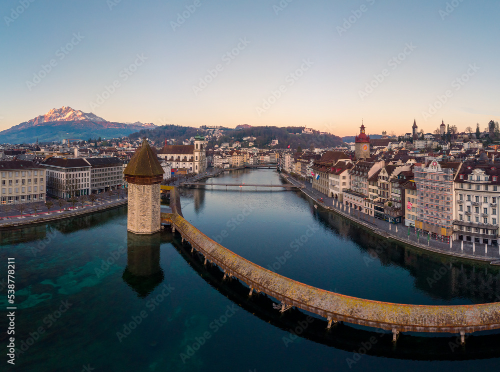 Lucerne, Switzerland: Aerial view of Lucerne old town along the Reuss river with the famous Chapel's bridge in Central Switzerland