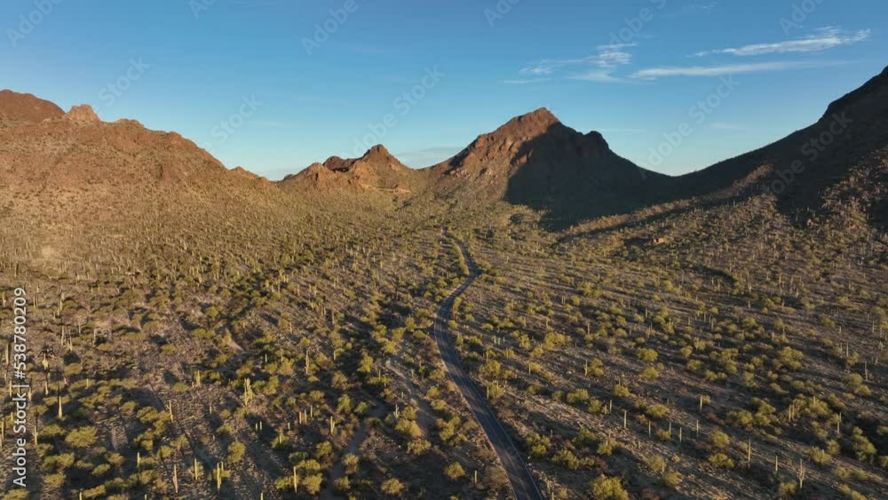 Scenic Desert Highway And Mountain Peaks In Tuscon Arizona, USA. Aerial Drone Shot Scenic Desert Highway And Mountain Peaks In Tuscon Arizona, USA. Aerial Drone Shot