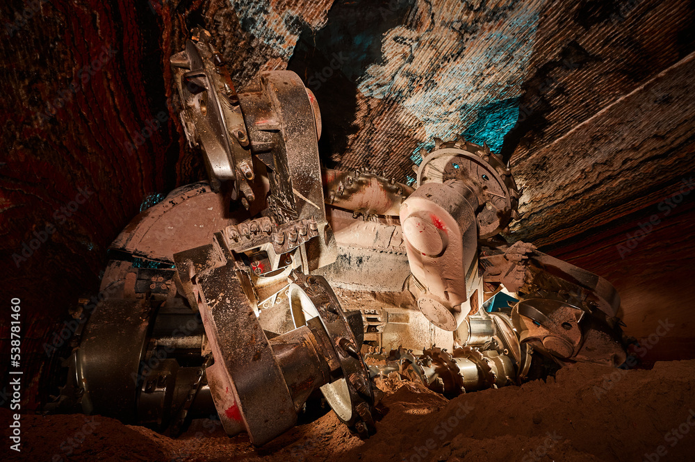 Mining machine with different saws in mineral quarry