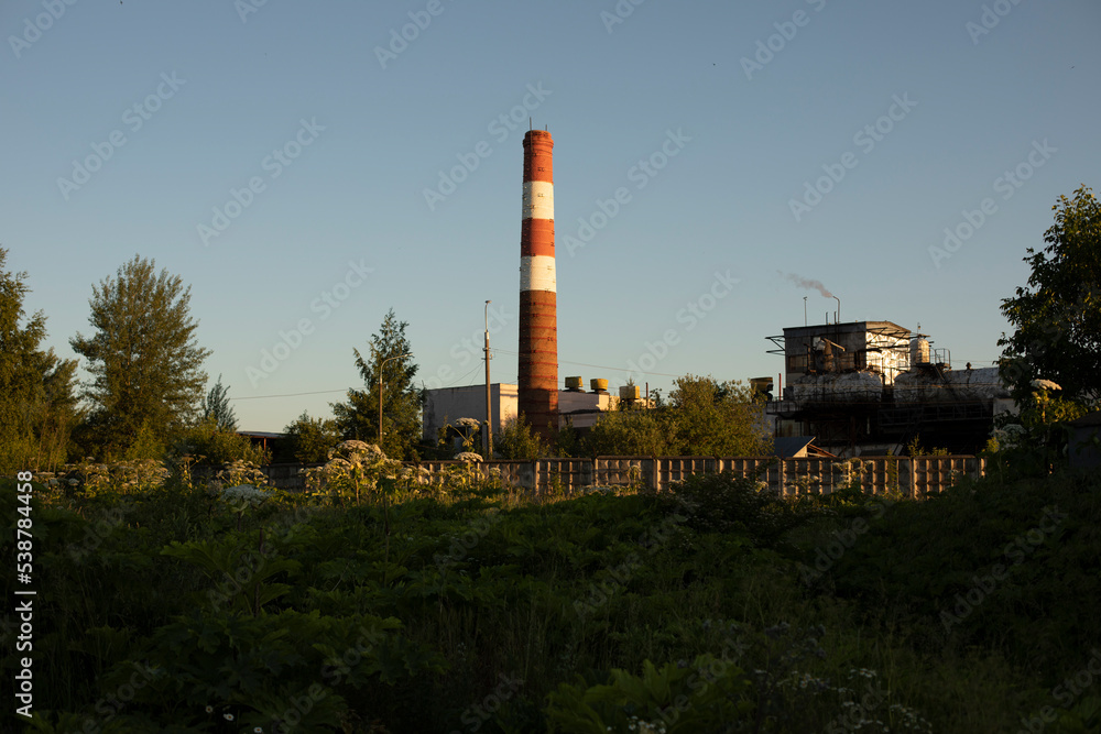 Boiler station pipe. Industrial landscape. View of factory.