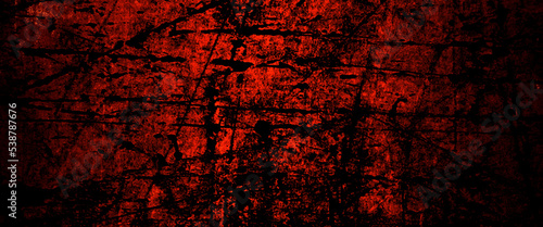 Grunge halloween background with blood splash space on wall, dark slate background toned classic red and black color, dark slate background toned classic red and black color. 