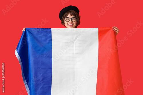 Young woman with flag of Fr...