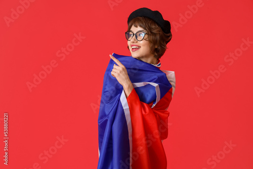 Young woman with flag of Fr...