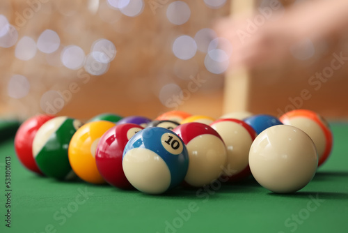 Canvas Print Colorful billiard balls on table, closeup
