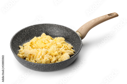 Frying pan with tasty scrambled eggs on white background