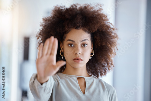 Hands, hr and manager stop sign with hand in office, serious, power and change in corporate. Black woman fighting sexual harassment, discrimination and toxic work environment with employee protection