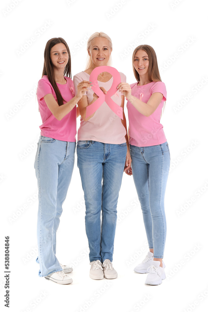 Fototapeta premium Beautiful women with pink awareness ribbons on white background. Breast cancer concept