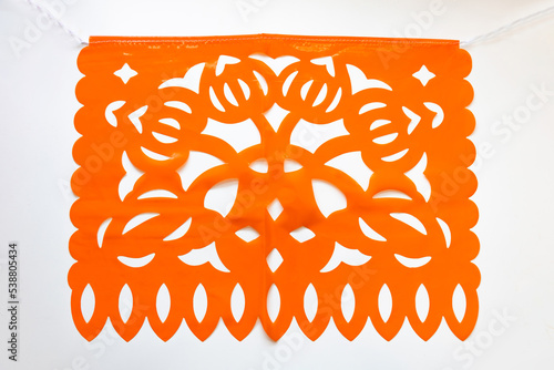 Day of the Dead, Papel Picado. with flower Orange traditional Mexican paper cutting flag. Isolated on white background.