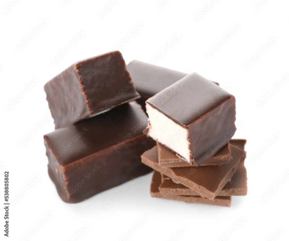 Tasty bird's milk candies and chocolate on white background Tasty bird's milk candies and chocolate on white background