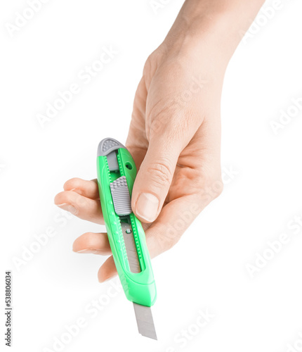 Woman with green utility kn...
