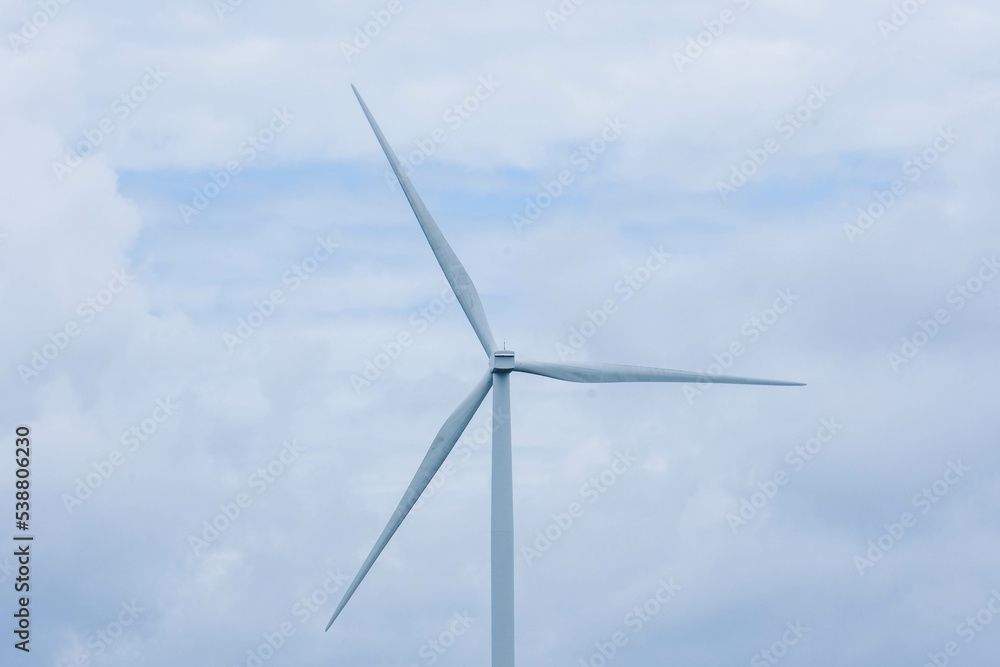 Windmill for electric power production with beautiful landscapes and blue skies to generate clean renewable green energy for sustainable development. Windmill for electric power production with beautiful landscapes and blue skies to generate clean renewable green energy for sustainable development.
