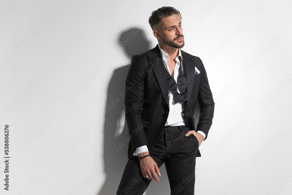 cool fashion model holding one hand in pocket cool fashion model holding one hand in pocket