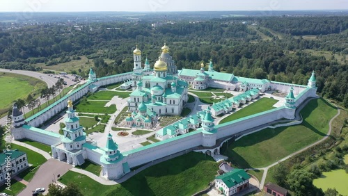 View from drone of impressive architectural complex of New Jerusalem Monastery in ancient Russian town of Istra in Moscow Oblast on summer day