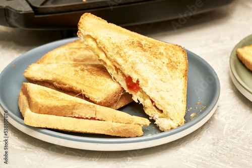 freshly baked delicious sandwiches in a sandwich box and on a plate