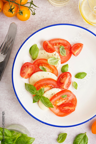 Caprese salad with sliced t...
