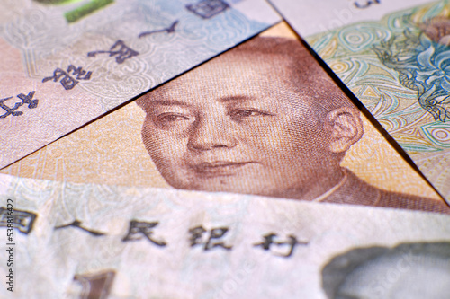 Wallpaper Mural Chinese yuan money, coins and banknotes close-up. Money with a portrait of Mao Zedong and yuan coins from China Torontodigital.ca