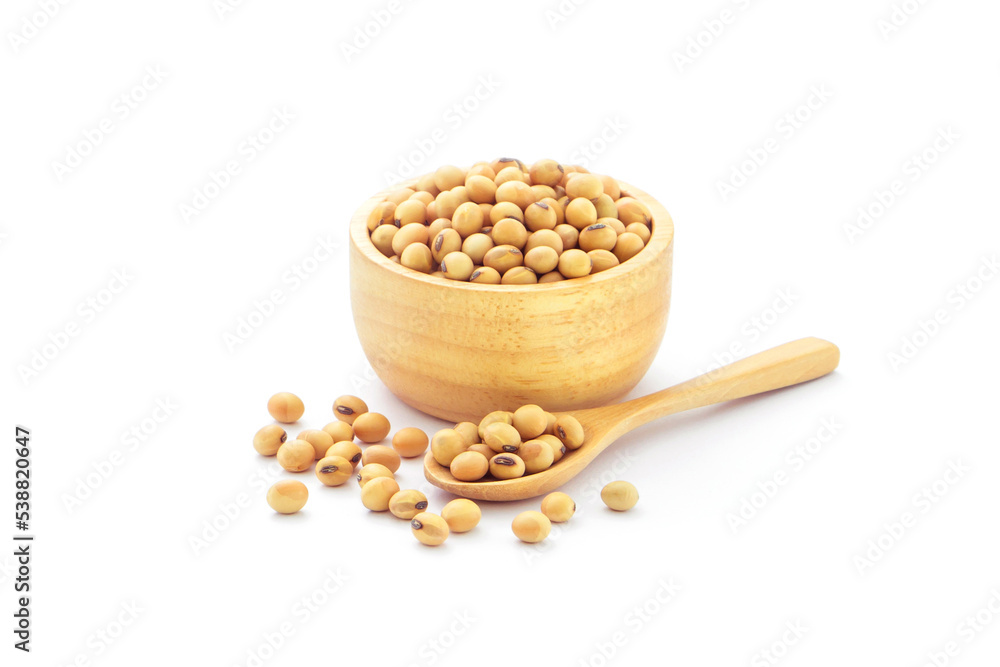 Soybean seeds in wooden bowl with spoon isolated on white background. Soybean seeds in wooden bowl with spoon isolated on white background.