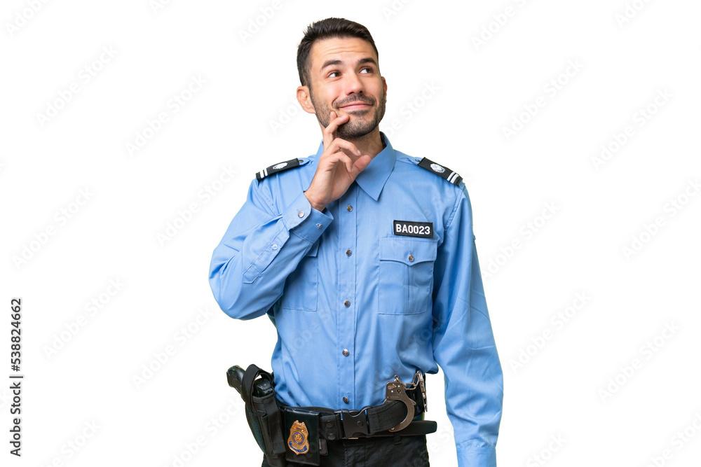Young police caucasian man over isolated background thinking an idea while looking up Young police caucasian man over isolated background thinking an idea while looking up