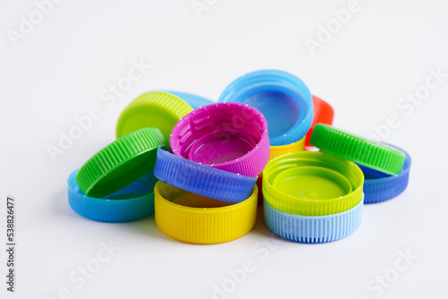 Plastic bottle caps colorful for recycle on white background.