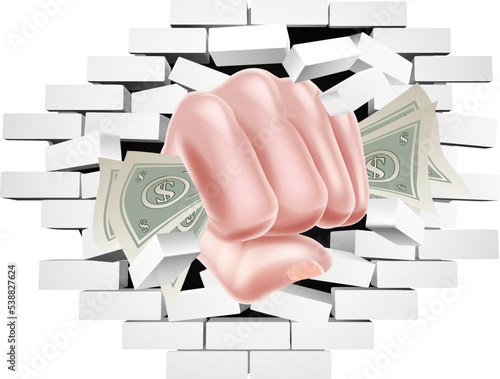 A fist hand holding money or cash punching through a brick wall