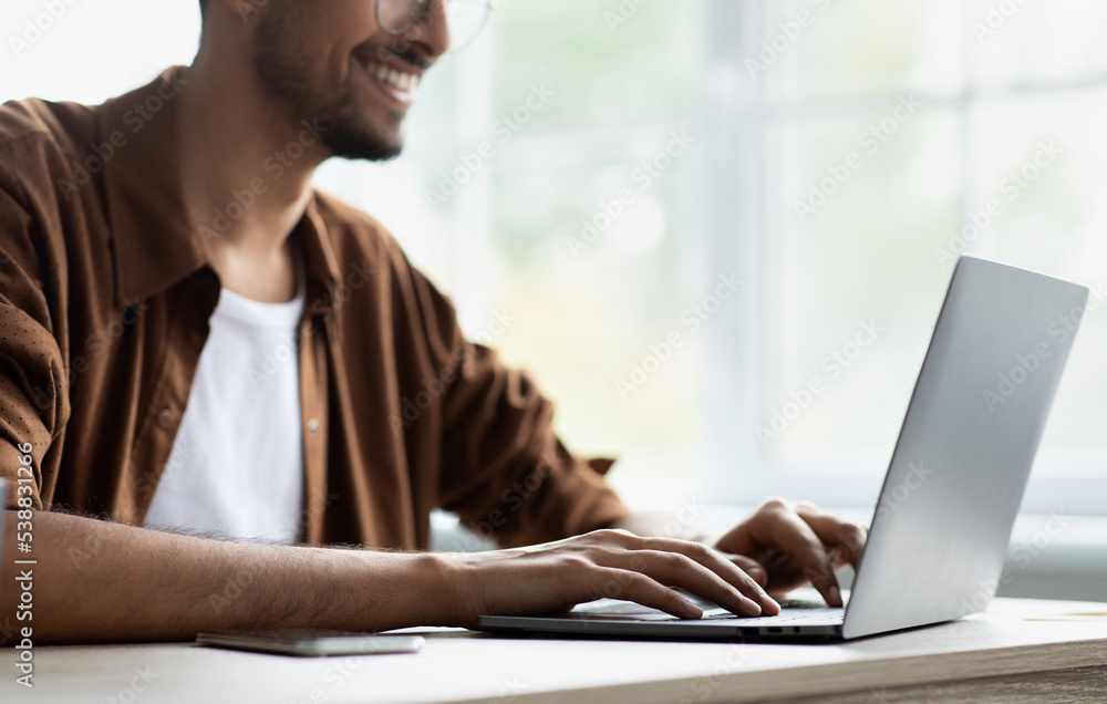 Cropped of middle eastern man employee working at office Cropped of middle eastern man employee working at office