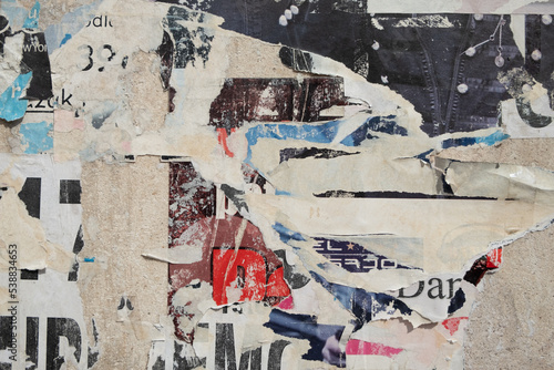 Torn street poster abstract background collage with ripped paper texture © DaliCeMedia
