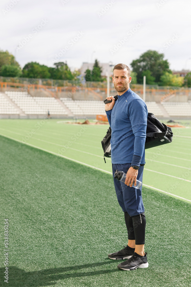 Athlete standing on sports field Athlete standing on sports field