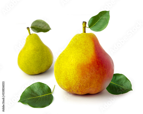 pear on a white background. Pear with leaves close up
