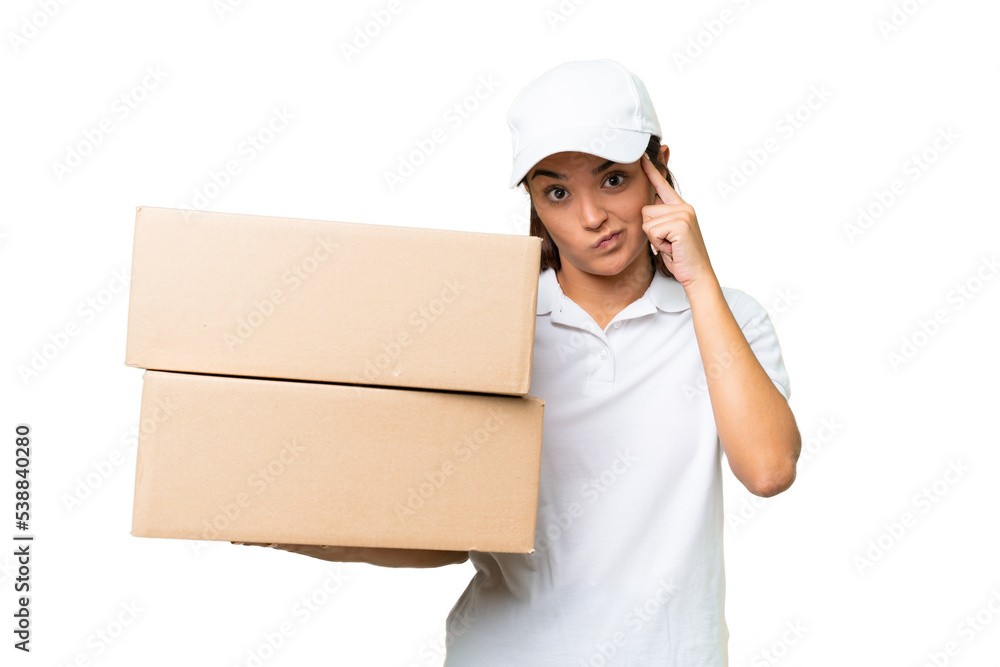 Delivery caucasian woman holding boxes isolated on green chroma background thinking an idea Delivery caucasian woman holding boxes isolated on green chroma background thinking an idea