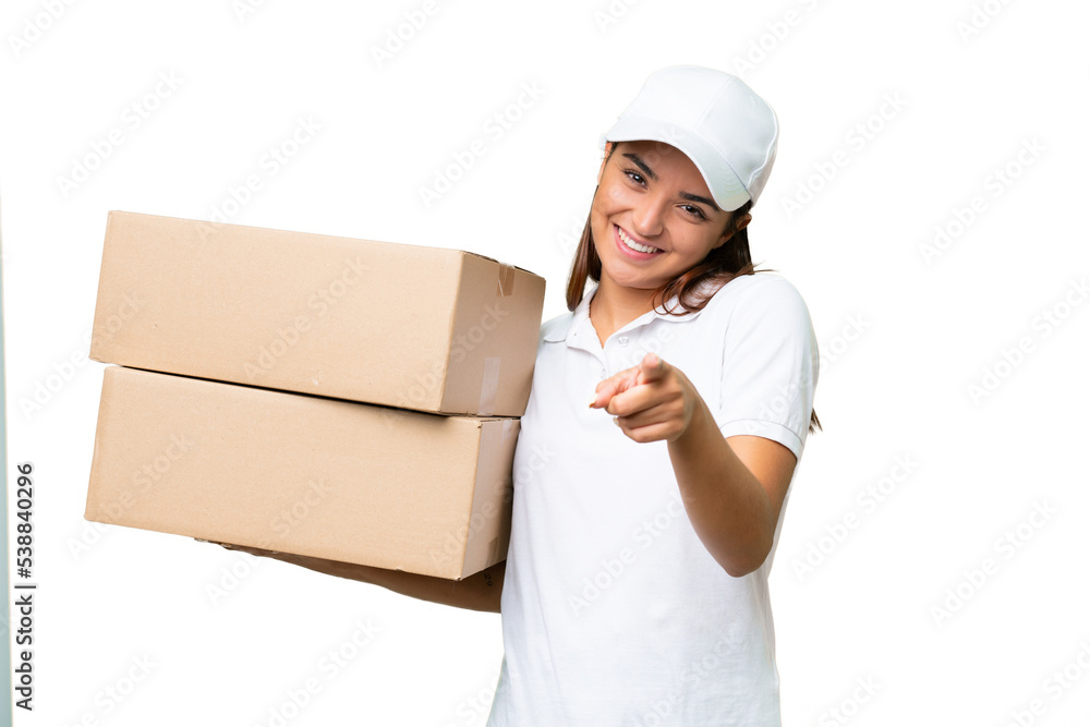 Delivery caucasian woman holding boxes isolated on green chroma background pointing front with happy expression Delivery caucasian woman holding boxes isolated on green chroma background pointing front with happy expression