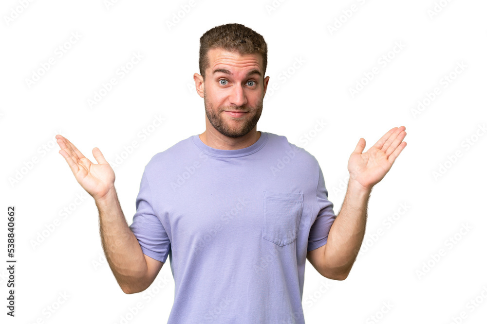 Young handsome caucasian man isolated on green chroma background making doubts gesture Young handsome caucasian man isolated on green chroma background making doubts gesture