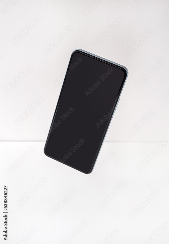 Smartphone mockup, phone with blank screen and shadow flying on white ...