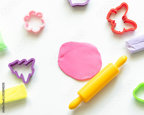 Tools for molding from plasticine on a white background. View from the top. photo