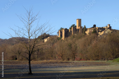Winter exterior view from afar of the town of Castell’Arquato, medieval village in Emilia Romagna, beautiful contryside of italy with many castles between the cities of Parma and Piacenza
