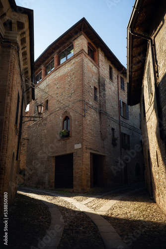 View of the streets and medieval palaces in the historic town of Castellâ€™Arquato, medieval village in Emilia Romagna, region of italy with many castles between the cities of Parma and Piacenza