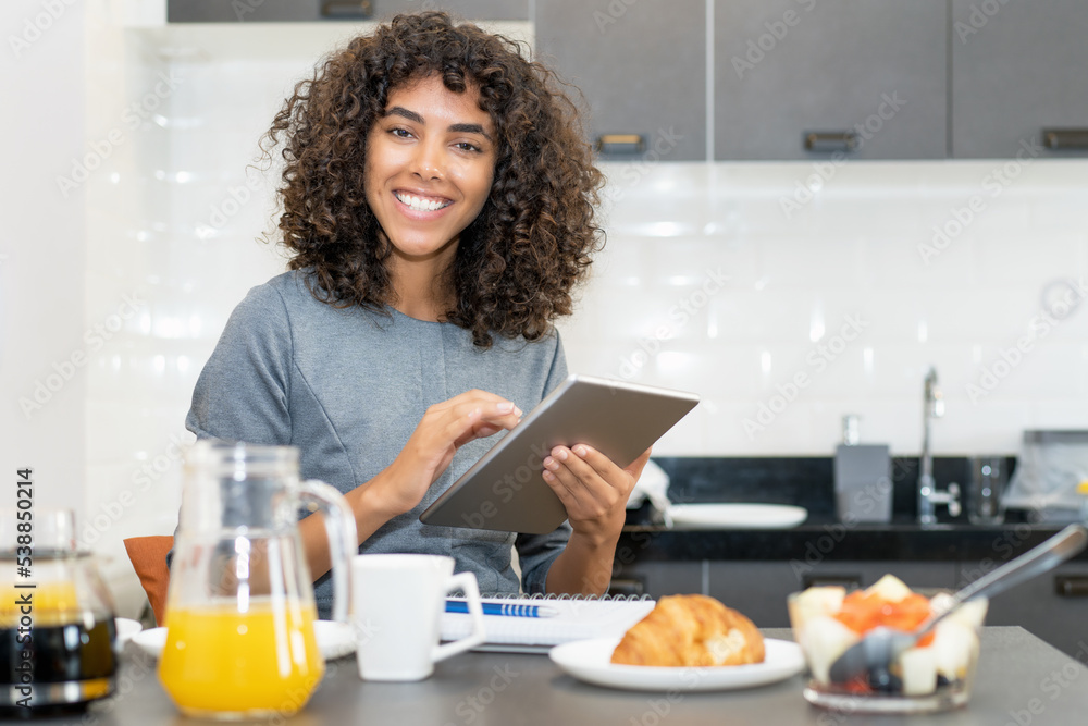 Beautiful latin american woman with tablet computer Beautiful latin american woman with tablet computer