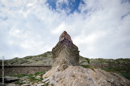 Ruins of the second world war italian military barracks and guardhouse near the pass of of San Bernolfo and Colle Lounge, hiking path between the french Alps and Piedmont (Italy) photo