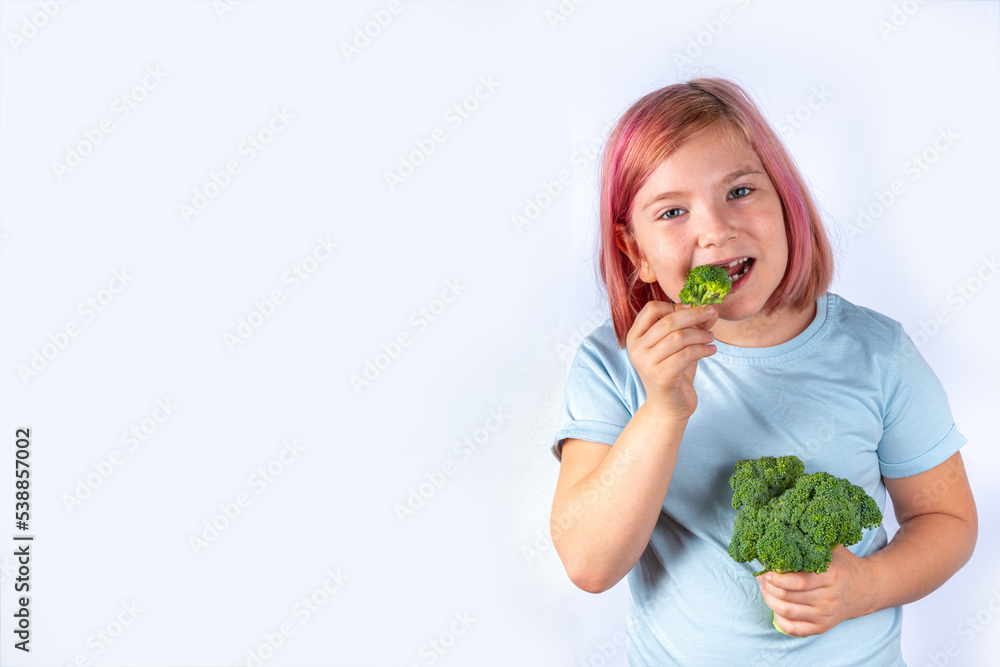 Cute kid girl eats broccoli Cute kid girl eats broccoli