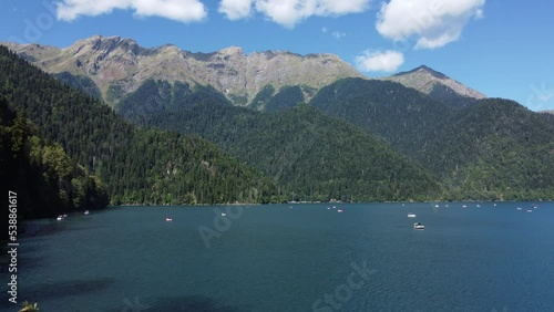  View from a height of the lake Ritsa in the Abkhazia mountains .  photo