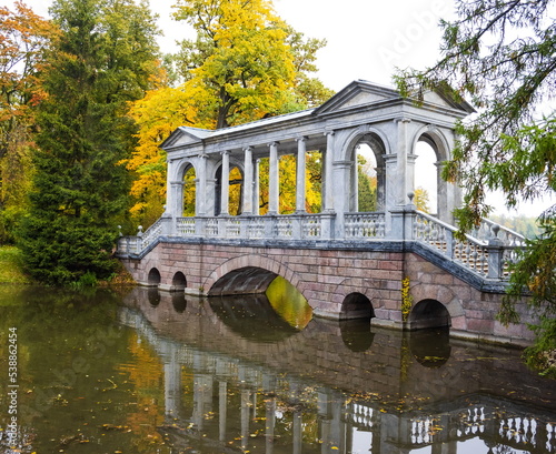 Autumn day in the park. Gold autumn. Trees and lake.