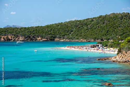 Fototapeta Naklejka Na Ścianę i Meble -  Tuerredda beach surrounded with it's famous turquoise sea, in the coast of Sardinia. Tuerredda bay Coast, Sardinia, Italy.
