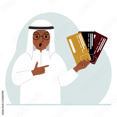 A man shows plastic cards. The concept of choosing a bank, terms of deposits and loans.