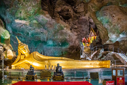 Wat Suwan Khuha temple in the cave with buddha statues, in Phang Nga, Thailand © pierrick