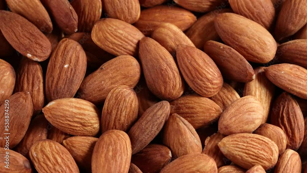 Almond nuts close up rotate in a circle Almond nuts close up rotate in a circle