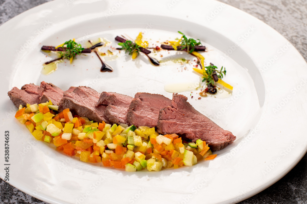 Dish of duck meat with vegetables and herbs. Healthy food Dish of duck meat with vegetables and herbs. Healthy food