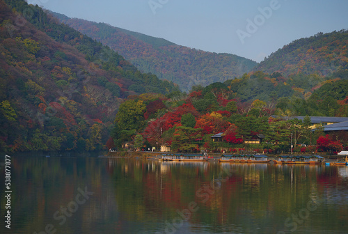 Service Boats on the river in Arashiyama Park with Autumn season, Kyoto, Japan.