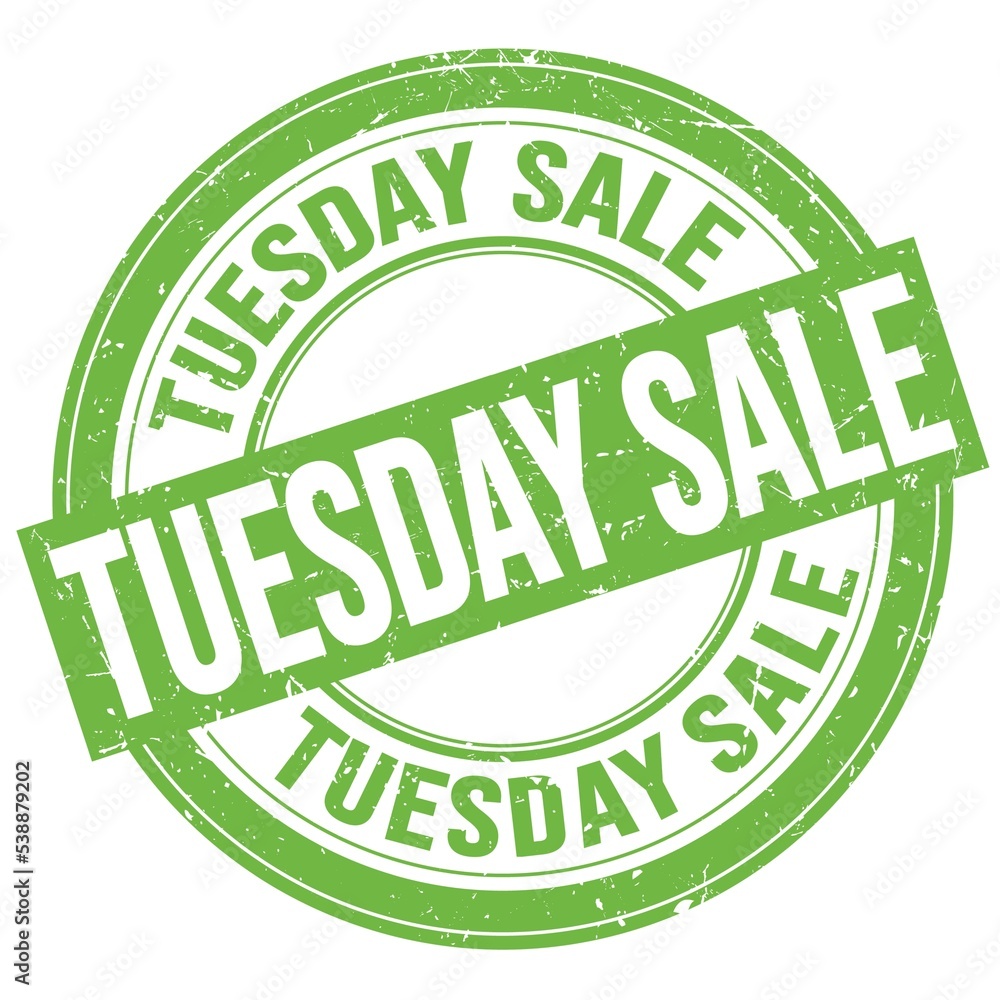 TUESDAY SALE text written on green round stamp sign TUESDAY SALE text written on green round stamp sign