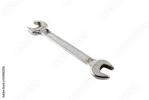Wrench, a tool for tightening nuts, old, rusted isolated on white background. © Parichart
